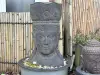 Product image 1 of the product “Javanese Ken Dedes head with a pot on it, can be used as planter. 54 x 54 x 101cm. Stone cast, handcrafted & coloured ”