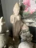 Product image 1 of the product “Standing Buddha with floral carving, Abudaya position. 37 x 32 x 152cm. Natural stone (river stone), stonemasonry ”