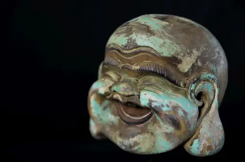 Artikelbild des Artikels “Lachender Buddha-Kopf aus Holz, 20 cm “