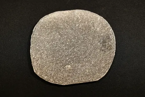 Artikelbild des Artikels “Dünne Platte aus Flussstein, ca. 15 cm Durchmesser “