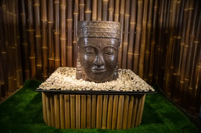 Product image 5 of the product “Khmer-head as water feature, 67cm height, cast stone, hollow, handcrafted & coloured ”