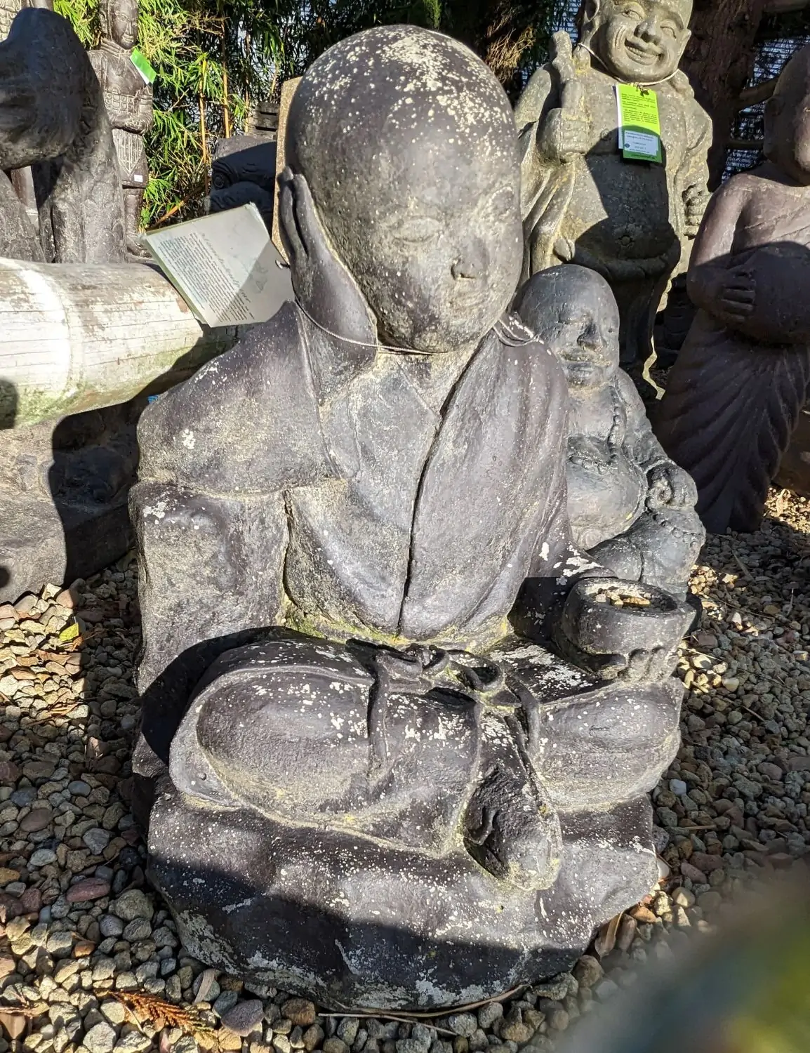 Product image 1 of the product “Sitting monk with bowl, 43 cm height, cast stone, handcrafted & coloured ”