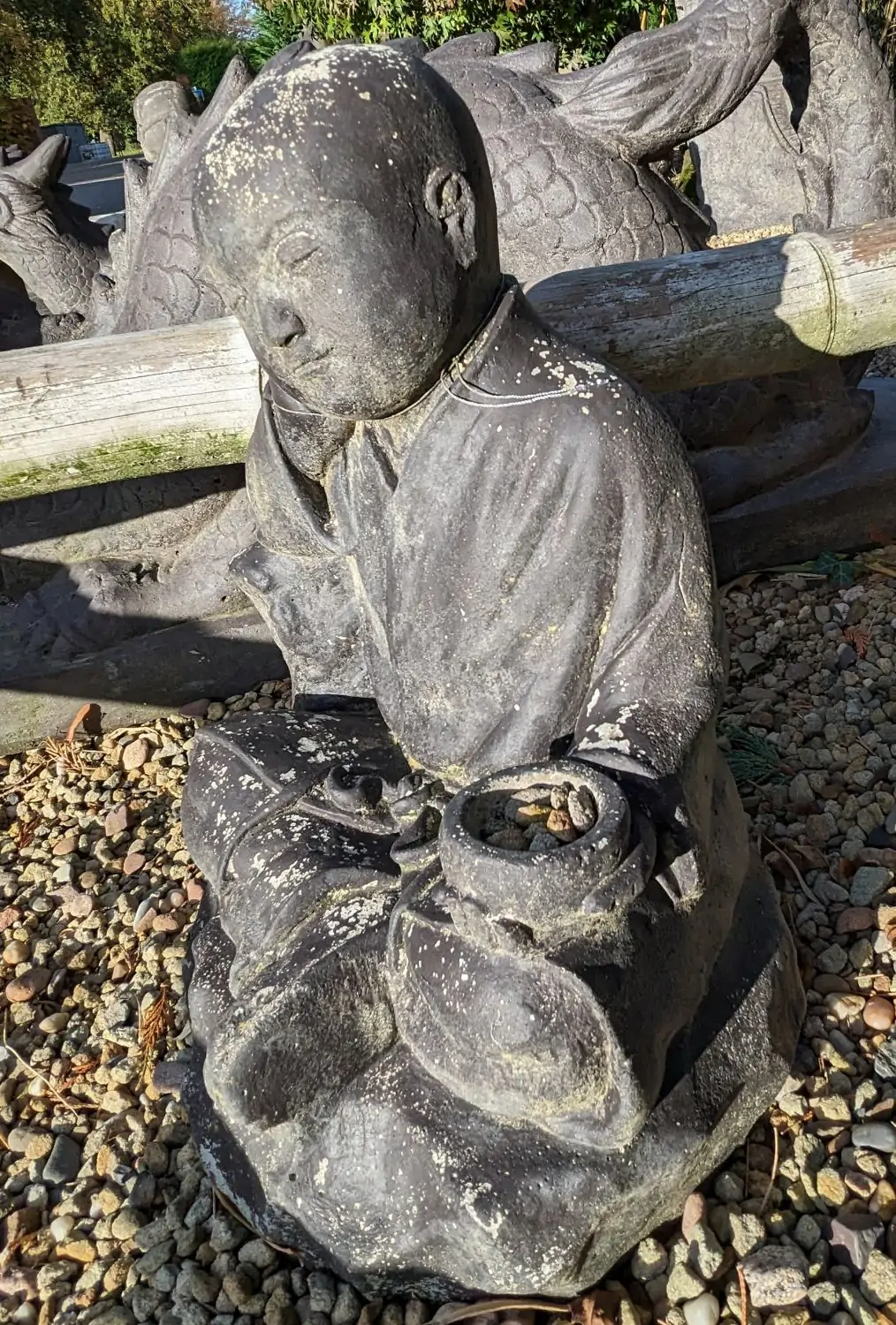 Product image 2 of the product “Sitting monk with bowl, 43 cm height, cast stone, handcrafted & coloured ”